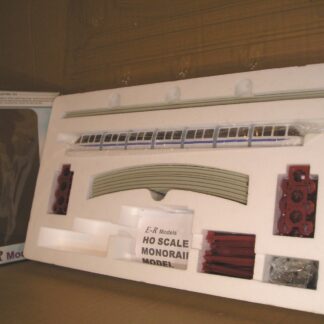 NAD0023s E-R Models 040-4903 monorail set and 2 extra straight track packs, near mint/mint boxed.